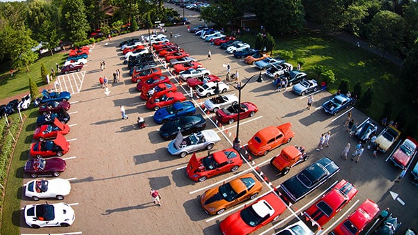 Aerial view of classic and custom cars parked at Gervasi Vineyard’s weekly summer Cruise-In car show event in Canton, Ohio.