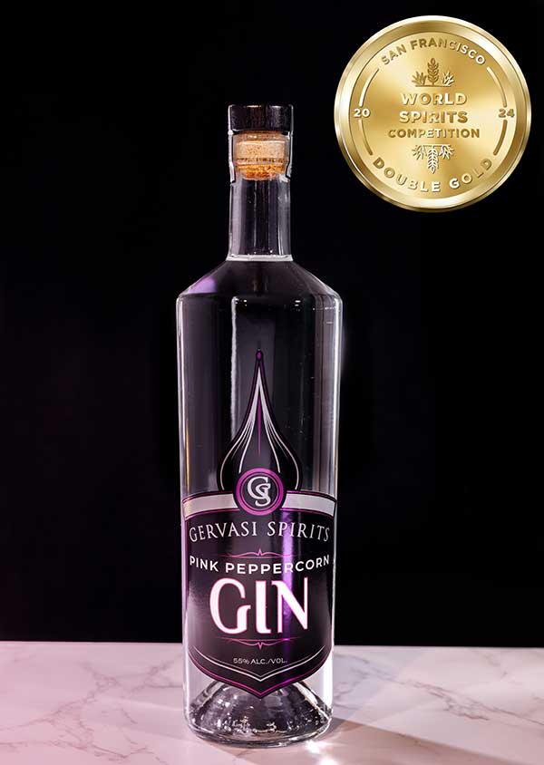 Gervasi Spirits Pink Peppercorn Gin displayed with its 2024 Double Gold Medal from the San Francisco World Spirits Competition.