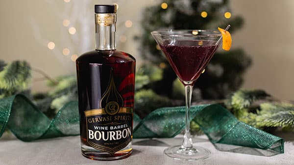 Wine Barrel Bourbon and festive cocktail in a martini glass—holiday spirit pairing from Gervasi Spirits in Canton, OH.