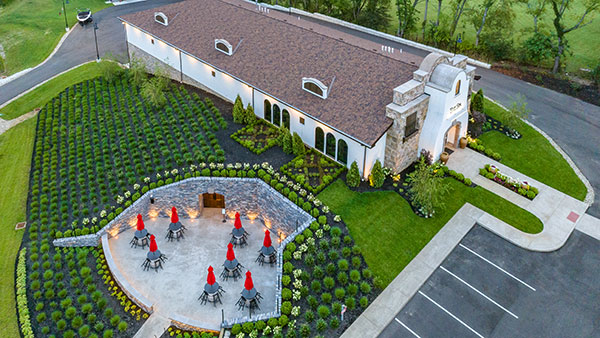 Aerial view of The Spa and Boutique at Gervasi Vineyard Resort surrounded by landscaped gardens